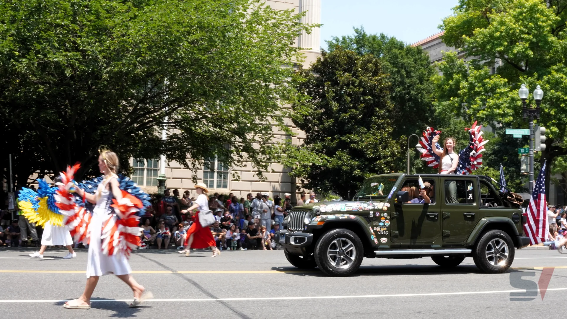 Participants in patriotic costumes celebrate Independence Day in Washington, D.C.