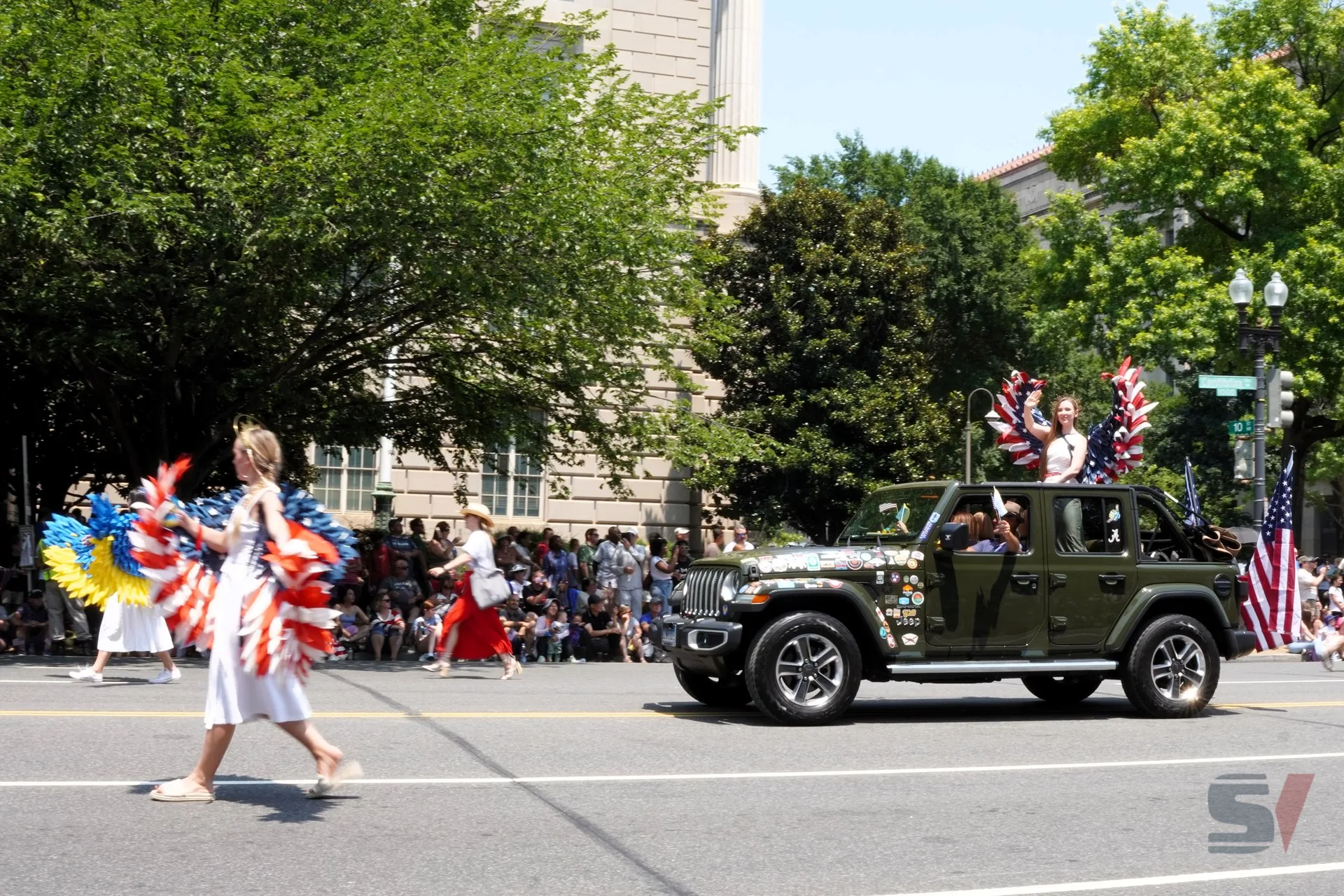 Participants in patriotic costumes celebrate Independence Day in Washington, D.C.