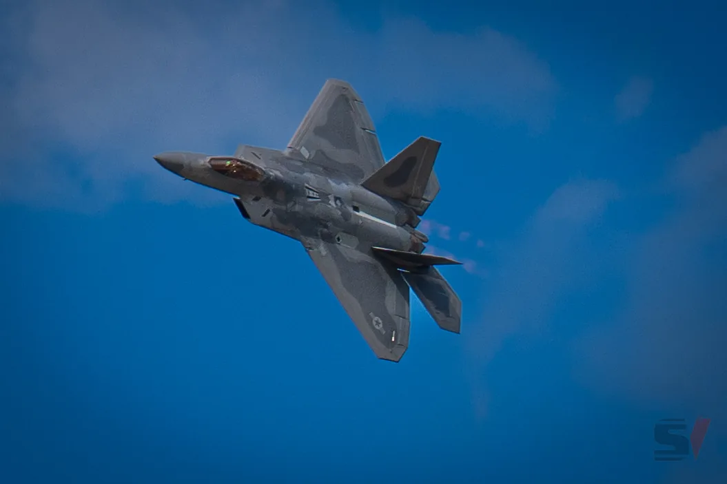 F-22 Raptor performing aerial maneuvers at NAS Oceana Air Show.